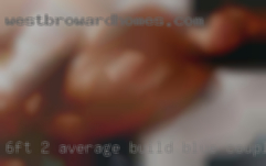 6ft 2, average build blue couple eyes.